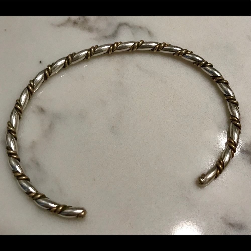 Silver bracelet with gold accents